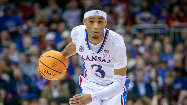 Mar 9, 2023; Kansas City, MO, USA; Kansas Jayhawks guard Dajuan Harris Jr. (3) brings the ball up court during the first half against the West Virginia Mountaineers at T-Mobile Center. Mandatory Credit: William Purnell-USA TODAY Sports